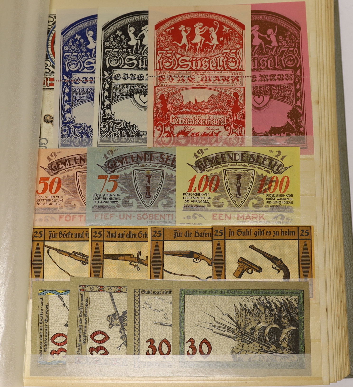 A large collection of German States and City banknotes, 1914-24, and Reichsbank notes from 1904-1948, the majority in near mint condition and a German East Africa one rupee banknote 1 November 1915, in two albums